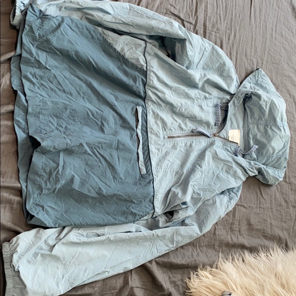 Light blue windbreaker